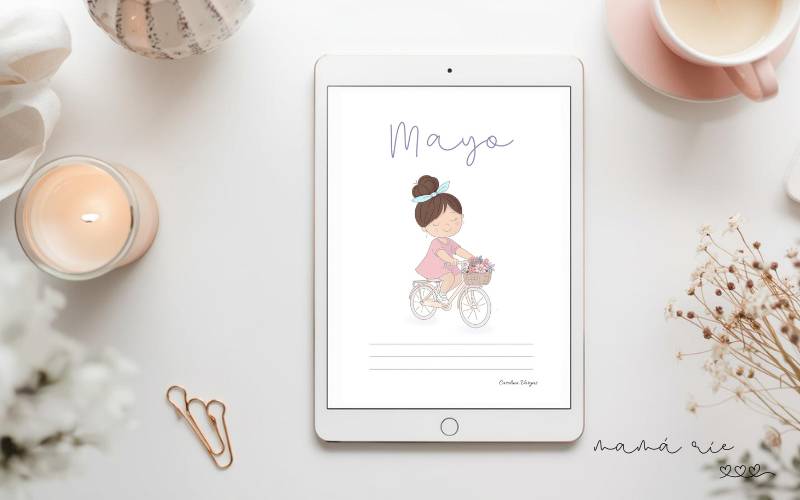 portada de mayo 2026 imprimible con ilustración de niña en bicicleta con flores estilo infantil